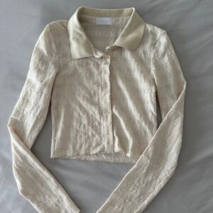 Isalis button up top